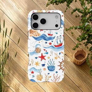 May include: A white smartphone case featuring a nautical-themed pattern with red sailboats, blue ocean waves, orange starfish, brown ship wheels, seagulls, and various coral elements scattered across the surface in a colorful, illustrative style.