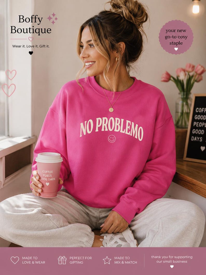May include: A woman wearing a bright pink sweatshirt with the words "NO PROBLEMO" in white. She is holding a pink coffee cup that says "COFFEE FUELS GOOD DAYS". The image also includes the text "Boffy Boutique" and "your new go-to cosy staple".