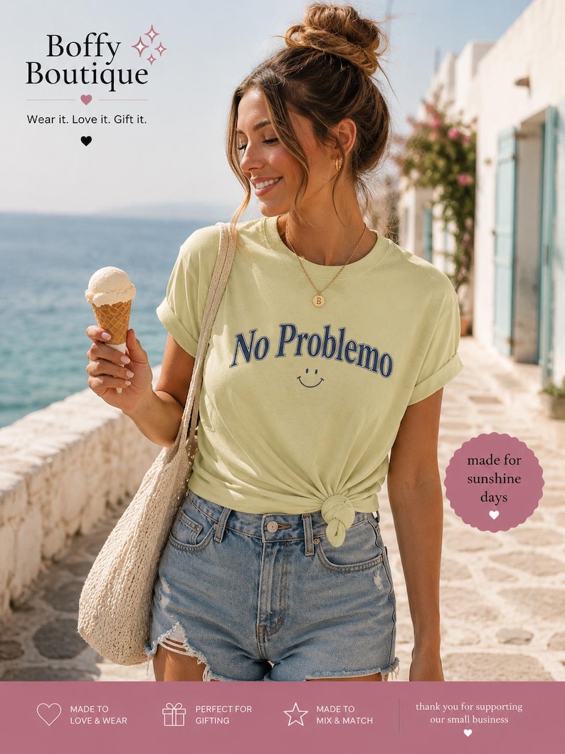 May include: A light yellow t-shirt with the words "No Problemo" in navy blue and a smiling face. The shirt is paired with denim shorts. The image also features a tote bag and an ice cream cone.