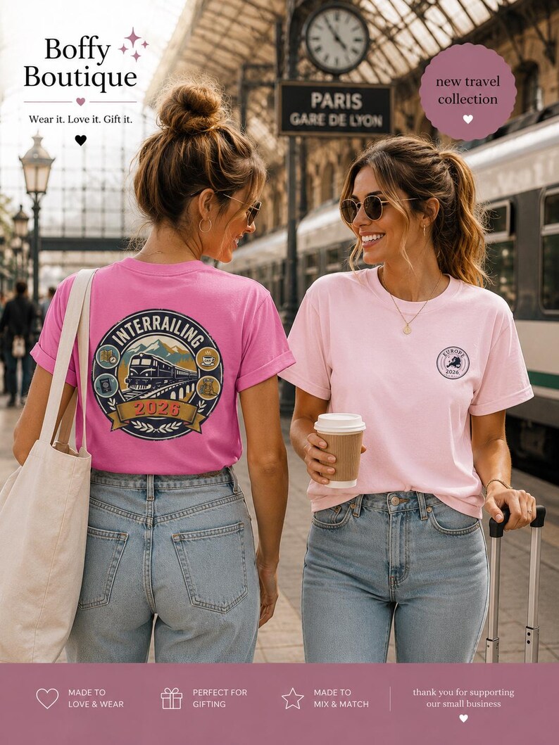 May include: A bright pink t-shirt featuring a large circular graphic on the back with a train, mountains, and the text 'INTERRAILING 2026'. A light pink t-shirt with a small circular 'EUROPE 2026' logo on the front chest. Both shirts are worn with blue jeans.