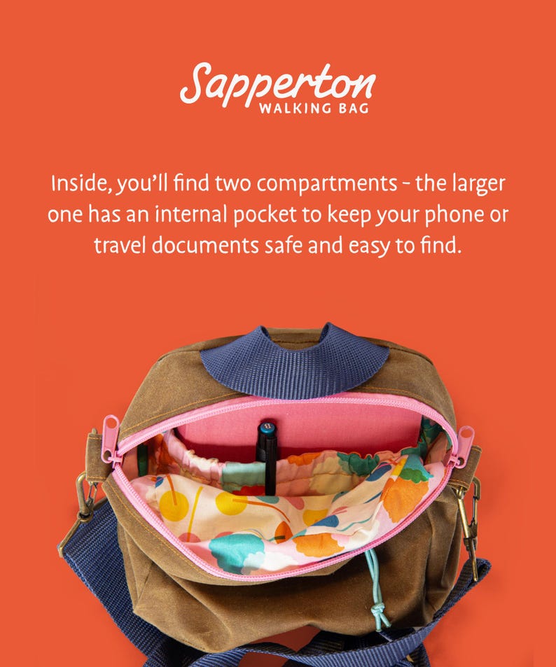 May include: A brown walking bag with a blue strap and a pink zipper. The bag has two compartments, one with an internal pocket. The bag has the text "Sapperton WALKING BAG" on the top. The interior has a colorful floral pattern.