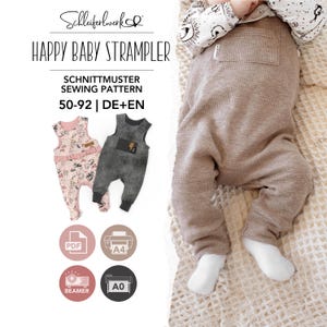 Op de afbeelding: Een naaipatroon voor een babyromper genaamd Happy Baby Strampler, maten 50-92. De afbeelding toont een beige wafelstof romper, een bloemrijke romper met ruches en een donkergrijze romper, met iconen voor PDF, A4, A0 en beamer-bestandsformaten.