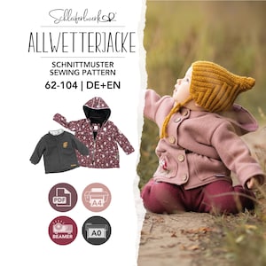 Könnte beinhalten: Ein Schnittmuster für eine Allwetterjacke von Schleiferwerk, Größen 62-104, auf Deutsch und Englisch. Das Bild zeigt eine dunkelgraue Jacke, eine Jacke mit Blumenmuster und ein Kind in einer rosa Jacke mit einer senfgelben Strickmütze.