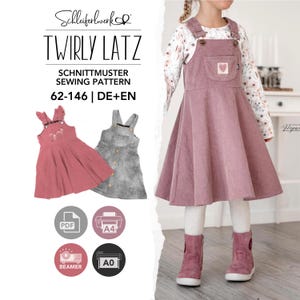 Puede incluir: Un patrón de costura para un vestido tipo pichi llamado Twirly Latz, tallas 62-146. La imagen muestra un pichi de pana rosa empolvado con bolsillo en el pecho y parche de corazón, junto a una versión gris y otra rosa con tirantes con volantes.