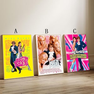 May include: Three rectangular movie posters for Austin Powers. Poster A has a yellow background with Mike Myers and a woman. Poster B features a collage of the cast. Poster C displays Mike Myers and a woman against a pink and blue Union Jack.