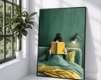 May include: A framed art print shows a person reading a yellow book in bed. The artwork uses a green colour scheme with a yellow pillow and blanket. A black lamp is lit, and a window with a plant is visible.