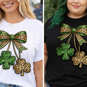 May include: White and black t-shirts featuring a St. Patrick's Day design. The design includes a bow with leopard print and green glitter accents, along with two shamrocks, one green and one leopard print.