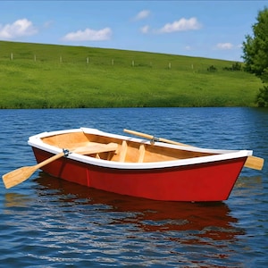 Puede incluir: Un pequeño bote de remos con casco rojo brillante y borda blanca. El interior cuenta con bancos y suelo de madera clara natural. Dos remos de madera están colocados en toletes metálicos a ambos lados del bote, sobre el agua.