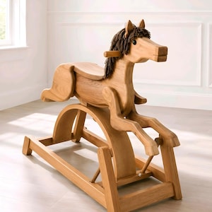 May include: A light oak rocking horse. The horse features a detailed mane and tail, and a saddle. The rocking horse is mounted on a wooden base with curved rockers. A classic toy for children. The horse measures approximately 100cm in length.