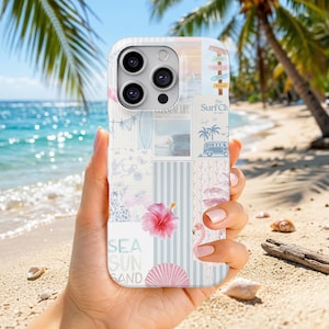 May include: A phone case featuring a collage of coastal imagery including a pink hibiscus flower, a flamingo, a seashell, blue stripes, and text that reads The Surf Club, Coastal Life, and Sea Sun Sand, with a triple camera lens cutout.