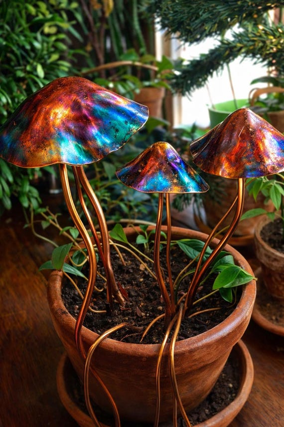 Iridescent copper mushroom plant stakes, hand made.