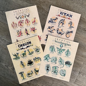 Op de afbeelding: Vier posters met illustraties van cryptiden uit New Mexico, Utah, Oregon en Washington. Elke poster heeft de titel "Cryptids of..." en tekeningen van mythische wezens in een vintage stijl, gedrukt op beige papier.