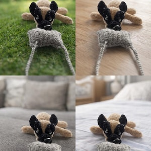 Può includere: Un giocattolo per cani fatto a mano all'uncinetto in beige e nero, con un'imbracatura e un guinzaglio in maglia grigia. Il cane è sdraiato, con la testa e le orecchie visibili. Il giocattolo è progettato per assomigliare a un pastore tedesco. Lo sfondo è sfocato.