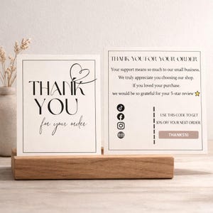 May include: A rustic wooden sign with the text "Welcome to our home" in white lettering. The sign features a distressed finish and a simple, inviting design, perfect for entryway decor.