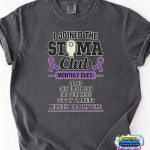 May include: Dark gray t-shirt with the text "I JOINED THE STOMA Club" in white and purple. The shirt lists "MONTHLY DUES" including "LEAKS" and "MIDNIGHT BAG EMPTYING". A digital download graphic is in the bottom right.