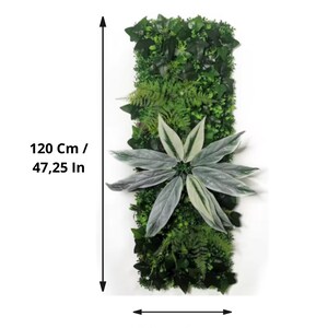 May include: Rectangular artificial plant wall, 47.25 inches tall and 15.75 inches wide, featuring a variety of green foliage. A large, silver-green plant with long leaves is centered on the wall. Ideal for indoor or outdoor decor.