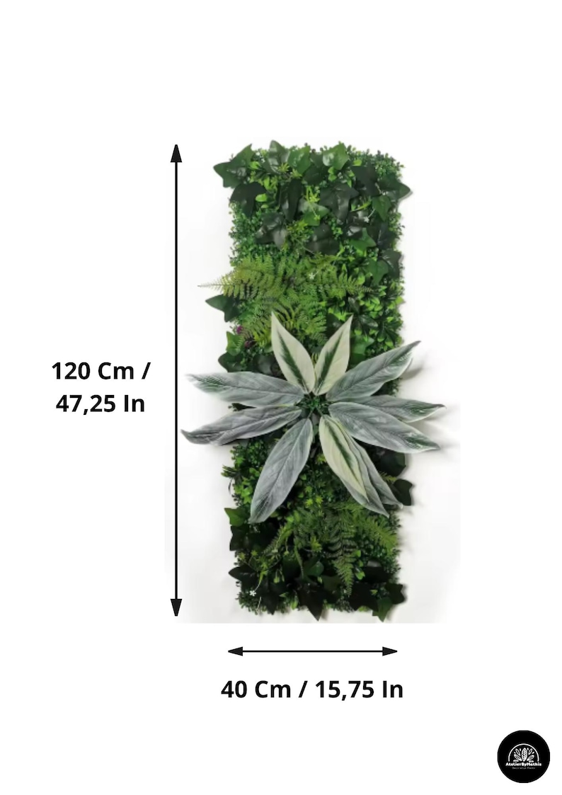 May include: Rectangular artificial plant wall, 47.25 inches tall and 15.75 inches wide, featuring a variety of green foliage. A large, silver-green plant with long leaves is centered on the wall. Ideal for indoor or outdoor decor.