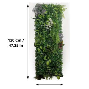 May include: A rectangular vertical artificial plant wall, 47.25 inches tall and 15.75 inches wide, densely packed with various shades of green foliage. The design includes a mix of leaf shapes and textures, with some gray and white accents.