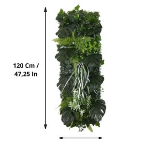 May include: Vertical artificial plant wall panel, 47.25 inches tall and 15.75 inches wide. The panel features a variety of green foliage, including large Monstera leaves, ferns, and other plant types. The panel is designed to mimic a natural green wall.