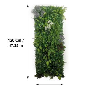 May include: Rectangular artificial plant wall, 47.25 inches tall and 15.75 inches wide, featuring a variety of green foliage. The wall includes different textures and shades of green, with some accents of white and burgundy.