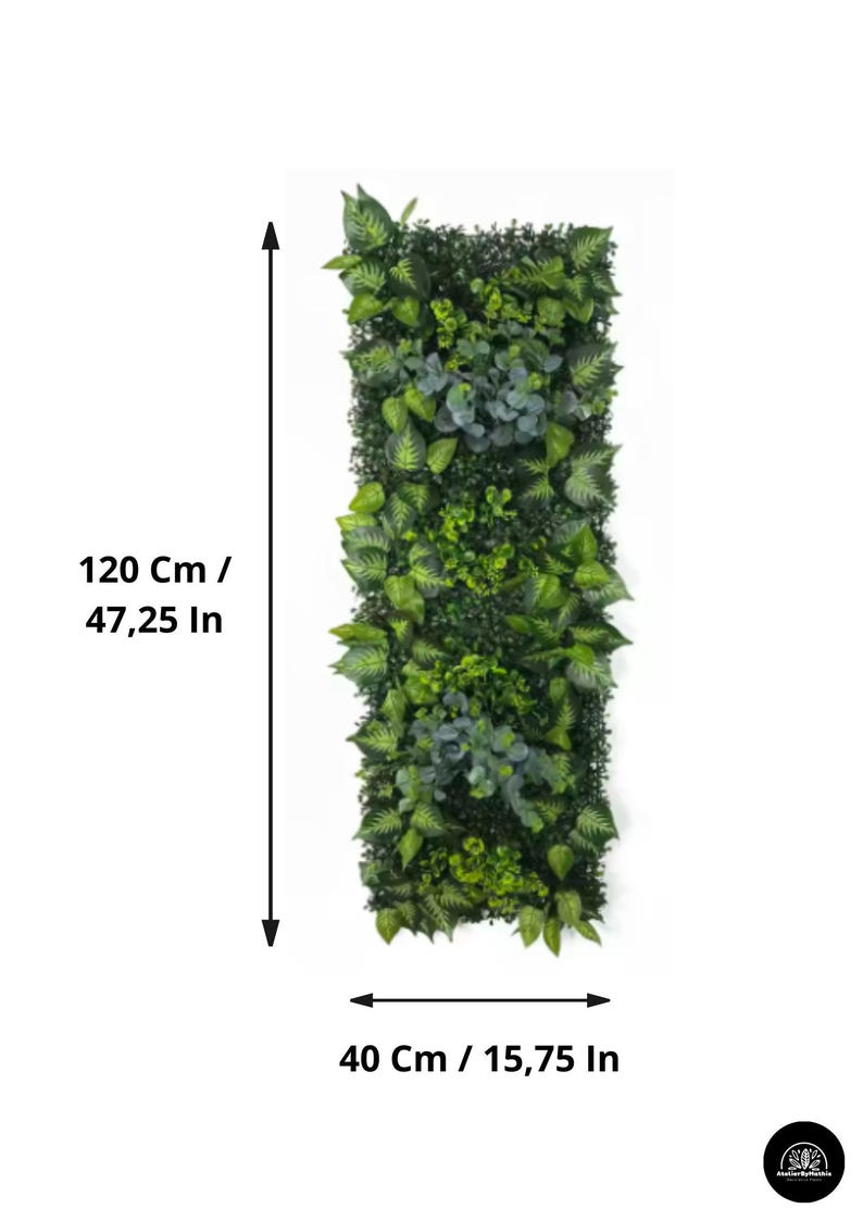 May include: A rectangular vertical wall decor piece filled with various shades of green artificial plants. The piece is 47.25 inches tall and 15.75 inches wide, offering a natural aesthetic. The design includes a mix of leaf shapes and textures.