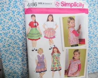 Girls apron pattern size 3 to 4  Simplicity #4286  uncut paper pattern