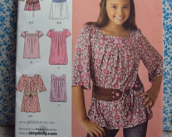 Girls dress or tunic top with belt pattern  Simplicity 2689