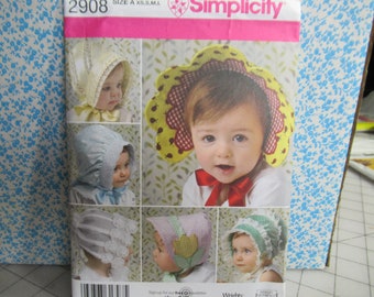 Baby bonnet paper pattern  Simplicity 2908,  uncut with factory fold