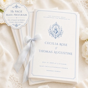 May include: A 16-page wedding mass program booklet in cream with blue text and a central sacred heart emblem. The cover reads: The Nuptial Mass Celebrating the Marriage of Cecilia Rose & Thomas Augustine, July 13, 2029, at 2 o'clock.