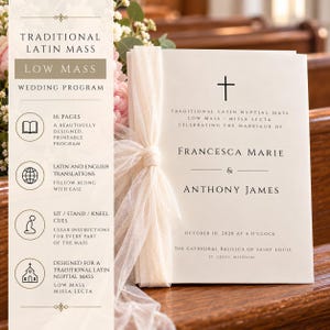 May include: A white wedding program booklet for a Traditional Latin Low Mass, tied with a sheer cream ribbon. The cover features a black cross, the names Francesca Marie and Anthony James, and the date October 10, 2028, at the Cathedral Basilica.