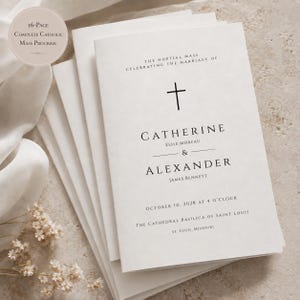May include: A 16-page complete Catholic Mass program booklet with a white cover featuring a black cross, the text The Nuptial Mass Celebrating the Marriage of Catherine Elise Moreau & Alexander James Bennett, October 10, 2028, and location details.
