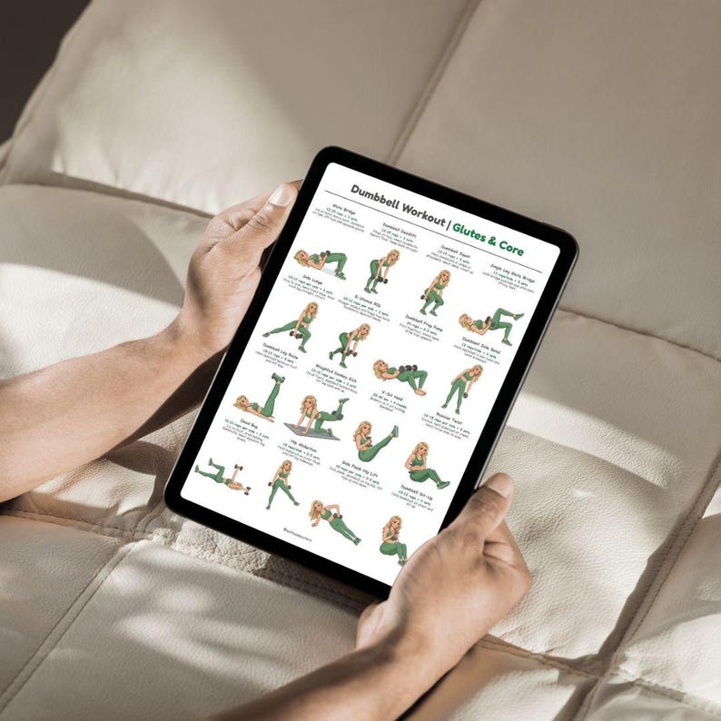 May include: A black tablet displaying a "Dumbbell Workout | Glutes & Core" guide. The guide features illustrations of various exercises with dumbbells, including squats, lunges, and bridges. The tablet is held by a person on a light-colored surface.