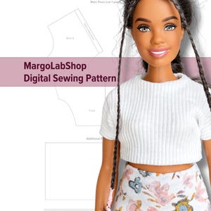 May include: A Barbie doll wearing a white ribbed crop top and a floral print skirt. The doll has long dark braids. The image includes a digital sewing pattern with the text "MargoLabShop Digital Sewing Pattern".