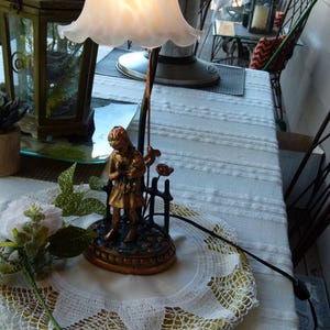 May include: A set of three ceramic mugs with a speckled, matte finish. The mugs are in shades of cream, light gray, and dark gray. Each mug has a simple, minimalist design and a rounded handle. The mugs are stacked on top of each other.