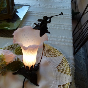 Vintage Art Pink and White Lily Glass Lamp with Flying Cherub Trumpet Playing Music on cast Metal Base