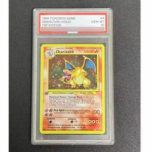 May include: A set of three ceramic mugs with a speckled, matte finish. The mugs are in shades of cream, light gray, and dark gray. Each mug has a simple, minimalist design and a rounded handle.