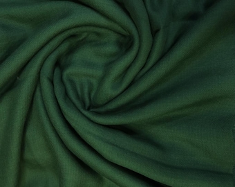 Sciarpa/stola/scialle morbido e caldo in cashmere verde scuro, realizzata a mano in Nepal.