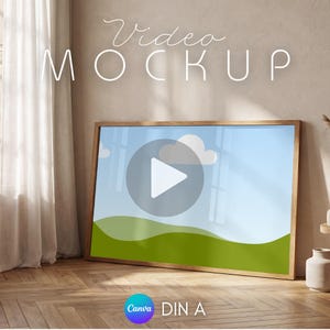 Peut inclure: Maquette vidéo encadrée en bois avec un ciel bleu, des collines vertes et un bouton de lecture. Les mots "Video Mockup" sont écrits en cursive en haut. Le logo Canva et "DIN A" sont en bas.