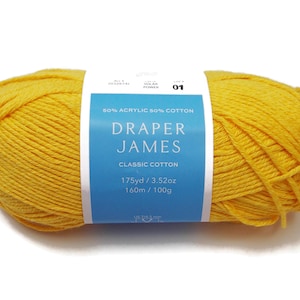 May include: A skein of yellow yarn with a label that reads "DRAPER JAMES CLASSIC COTTON". The label also indicates the yarn is 50% acrylic and 50% cotton, with 175 yards / 3.52 ounces. The yarn is a bright, sunny yellow color.