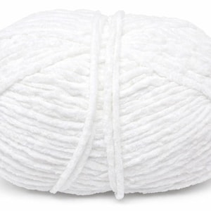 May include: A large ball of white yarn, tightly wound and textured. The yarn appears soft and plush, with visible strands creating a ribbed effect. Ideal for knitting or crocheting projects.