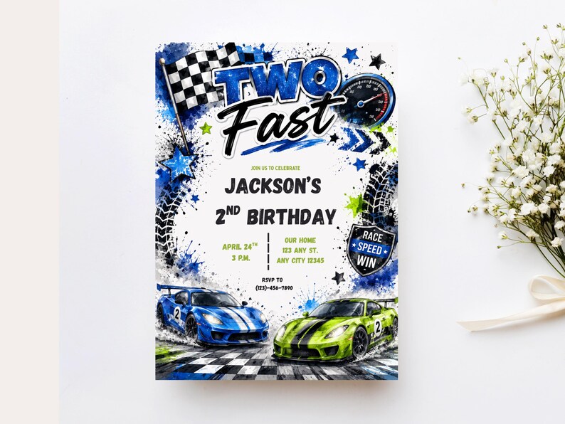 May include: A rectangular birthday invitation card featuring a race car theme with blue and green sports cars, a checkered flag, a speedometer, and tire tracks. The text reads TWO FAST, JACKSON'S 2ND BIRTHDAY, APRIL 24TH, 3 P.M., OUR HOME, 123 ANY ST., ANY CITY 12345, RSVP TO (123)-456-7890, and RACE SPEED WIN.
