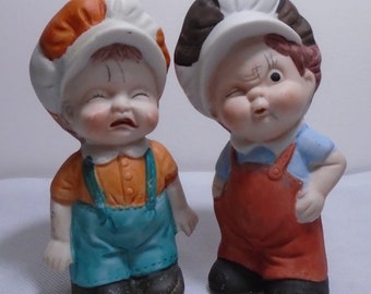 Two Cute Little Boys Vintage Ceramic Figurines One Tough Guy and One Crybaby