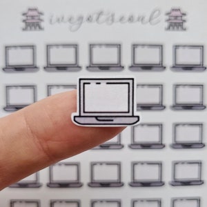 May include: A sheet of clear stickers with multiple black and white laptop computer icons. The icons are arranged in a grid pattern.