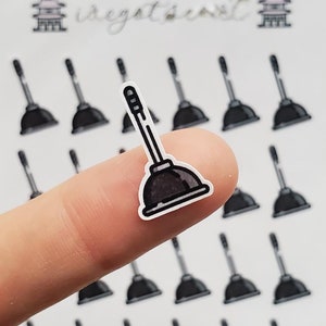 Op de afbeelding: Een vel stickers met een zwart-witte afbeelding van een zuiger. Het vel bevat in totaal 20 stickers.