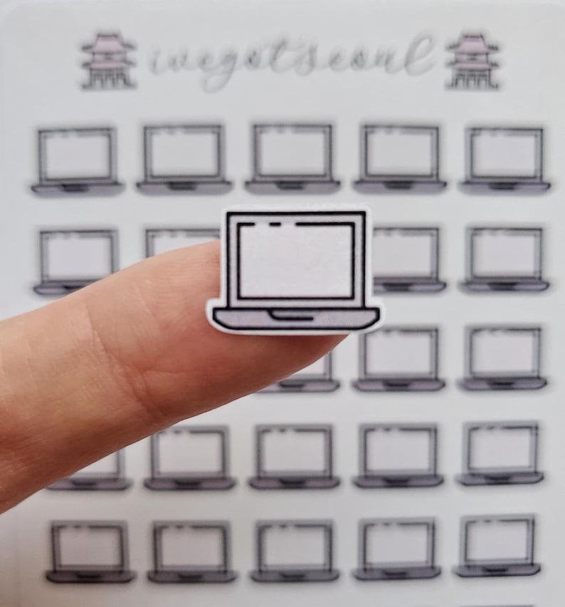 May include: A sheet of clear stickers with multiple black and white laptop computer icons. The icons are arranged in a grid pattern.