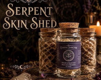May include: Three clear glass jars with cork stoppers filled with textured, light-colored serpent skin shed. The central jar features a purple label with the text Etheric Sanctum, Premium Selection, and 1oz volume, alongside a circular logo.