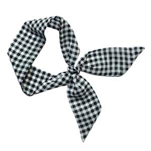 May include: A black and white gingham hair scarf tied in a bow.