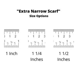 May include: Three rulers showing different widths for a scarf: 1 inch, 1 1/4 inches, and 1 1/2 inches. "Extra Narrow Scarf" is written above the rulers.