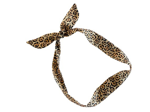 Extra narrow hair scarf for women. Animal print fabric hair tie to use as a hairband for ponytail, braid or bun. Offered in three sizes.