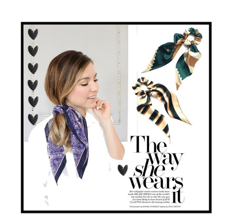 May include: Two silk hair scrunchies with a green and gold striped pattern and a brown and green striped pattern. The text "The way she wears it" is printed below the scrunchies.